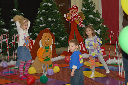 Three Kids Playing on the Candy Land Board